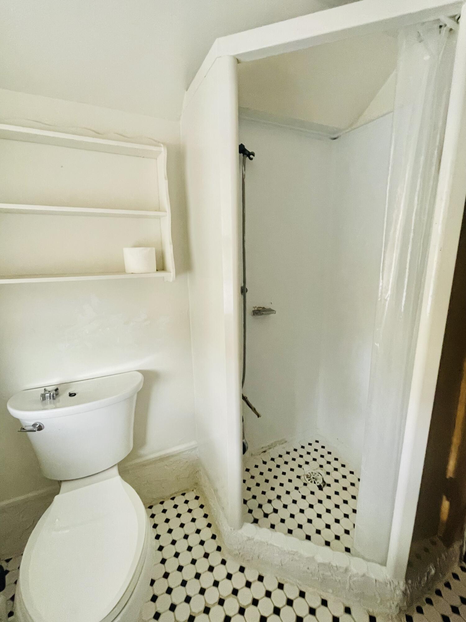 1917 Langdon Road Southwest Roanoke, VA 24015 - Photo 29 of 54 a bathroom with a toilet and a shower