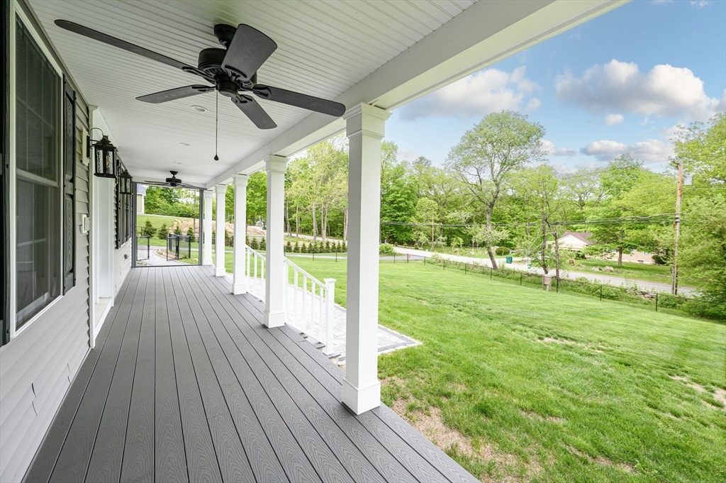1310 North Brookfield Road Oakham, MA 01068 - Photo 5 of 30 a view of a porch with wooden floor and garden