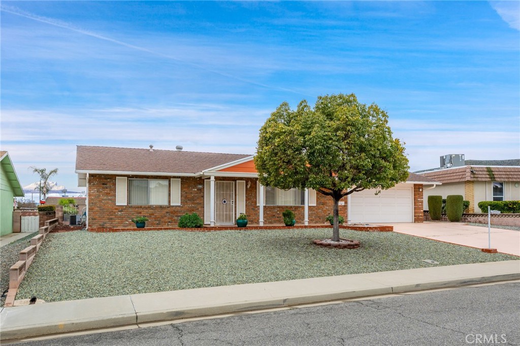 25779 Sandy Lodge Road Menifee, CA 92586 - Photo 1 of 1 a front view of a house with a yard