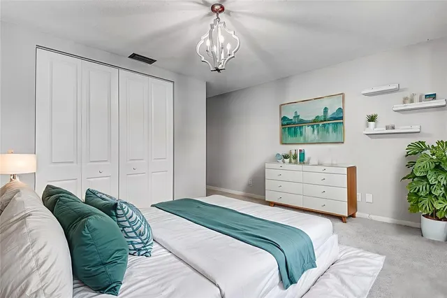 a view of a bathroom from a corridor