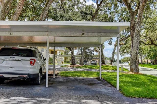a aerial view of a house with a yard