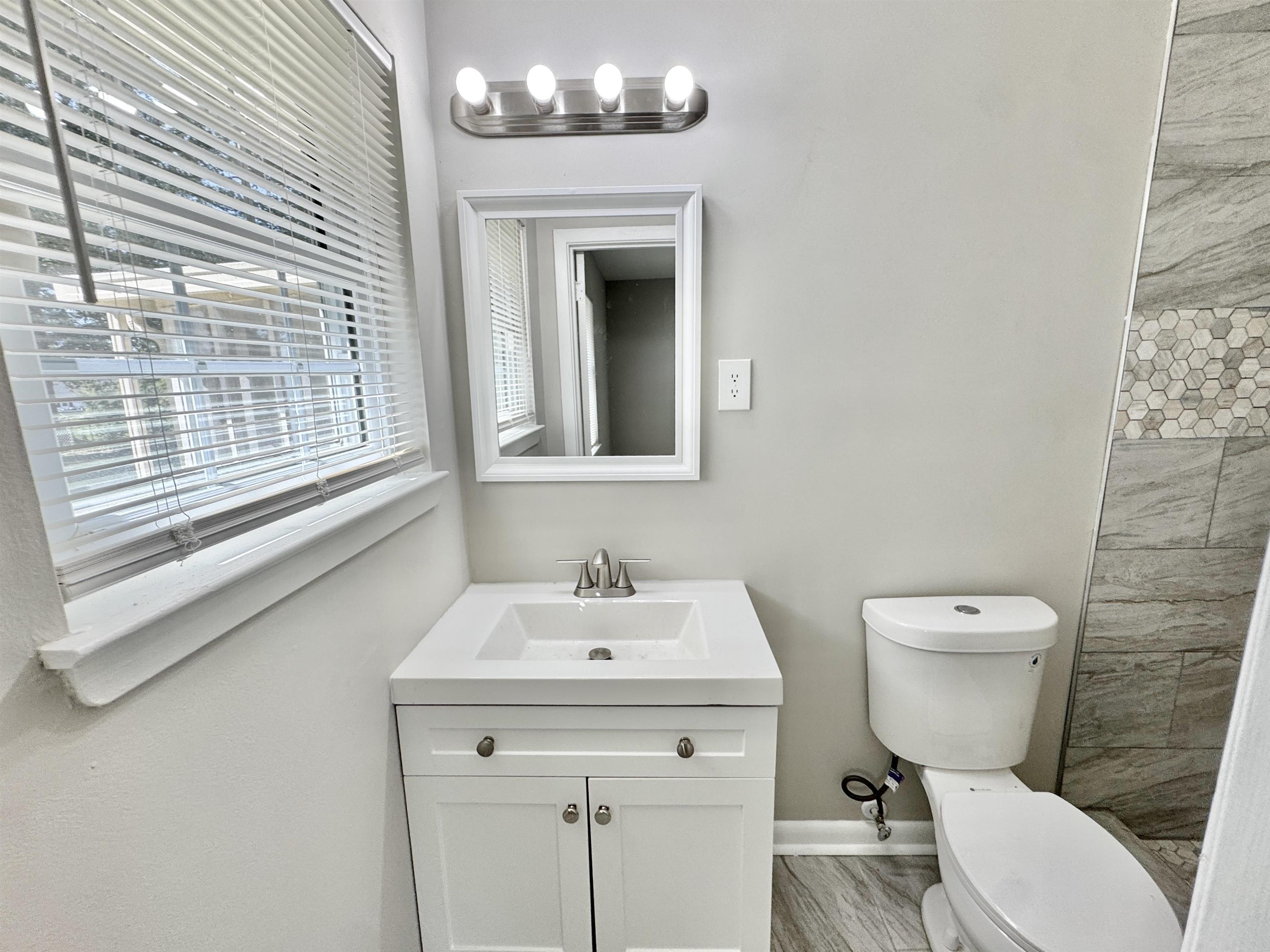 5095 Bowie Road Memphis, TN 38109 - Photo 15 of 25 Full bath featuring toilet and vanity