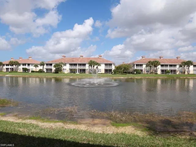 a view of a lake with houses