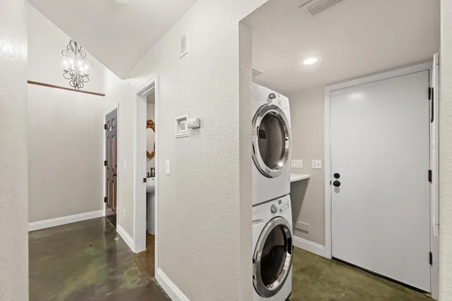a view of a storage & utility room with washer and dryer