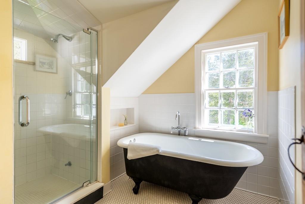 168 Argilla Road Ipswich, MA 01938 - Photo 19 of 32 a room with a bed and a window