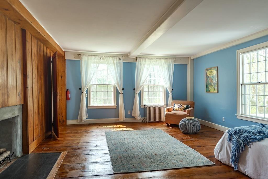 168 Argilla Road Ipswich, MA 01938 - Photo 20 of 32 a living room with furniture and a window