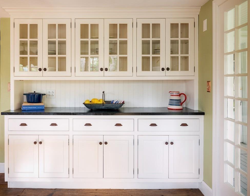 168 Argilla Road Ipswich, MA 01938 - Photo 7 of 32 a white kitchen with white cabinets and sink
