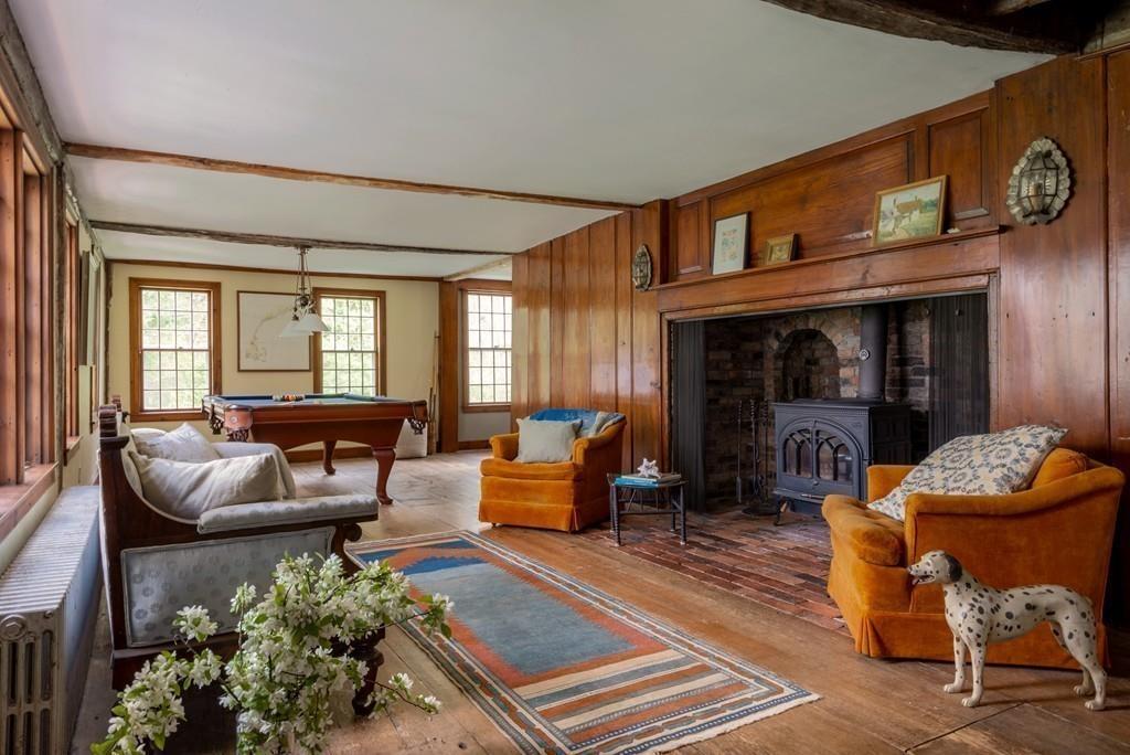 168 Argilla Road Ipswich, MA 01938 - Photo 10 of 32 a living room with furniture fireplace and window