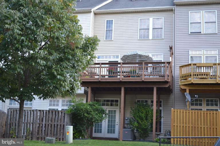 6650 Debra Lu Way Springfield, VA 22150 - Photo 1 of 25 a view of a house with a balcony and plants
