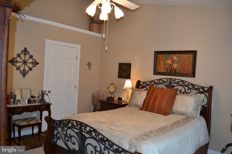 6650 Debra Lu Way Springfield, VA 22150 - Photo 13 of 25 a bedroom with bed and a window