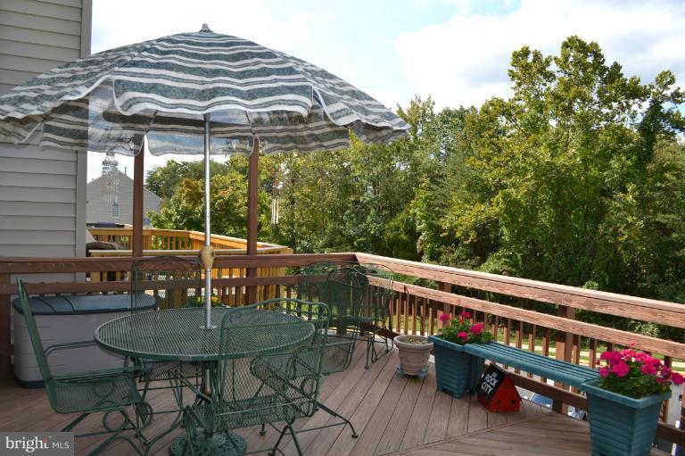 6650 Debra Lu Way Springfield, VA 22150 - Photo 24 of 25 a balcony with table and chairs