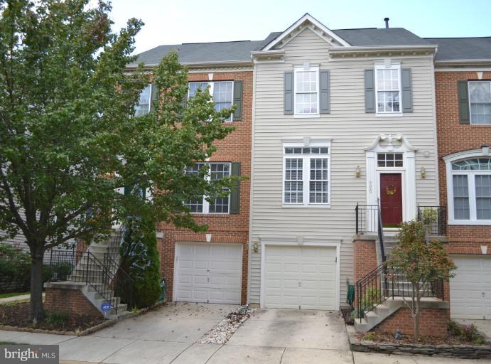 6650 Debra Lu Way Springfield, VA 22150 - Photo 25 of 25 a front view of a house with a yard