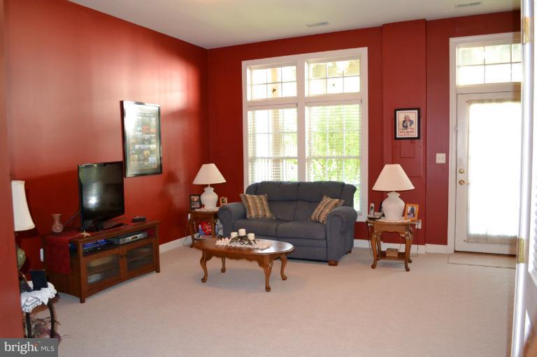 6650 Debra Lu Way Springfield, VA 22150 - Photo 5 of 25 a living room with furniture and a window