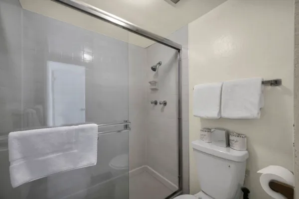 a view of a hallway with washer and dryer