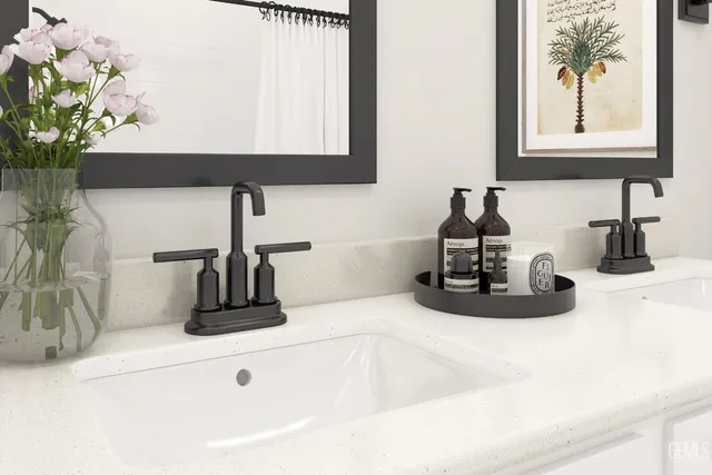 a bathroom with a sink a faucet and a mirror