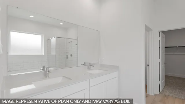 a bathroom with a bathtub and a sink