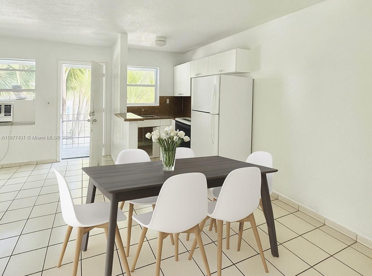 855 West 29th Street, Unit 19 Hialeah, FL 33012 - Photo 2 of 8 a view of a dining room with furniture