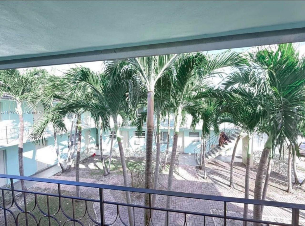 855 West 29th Street, Unit 19 Hialeah, FL 33012 - Photo 7 of 8 a view of outdoor space with seating area