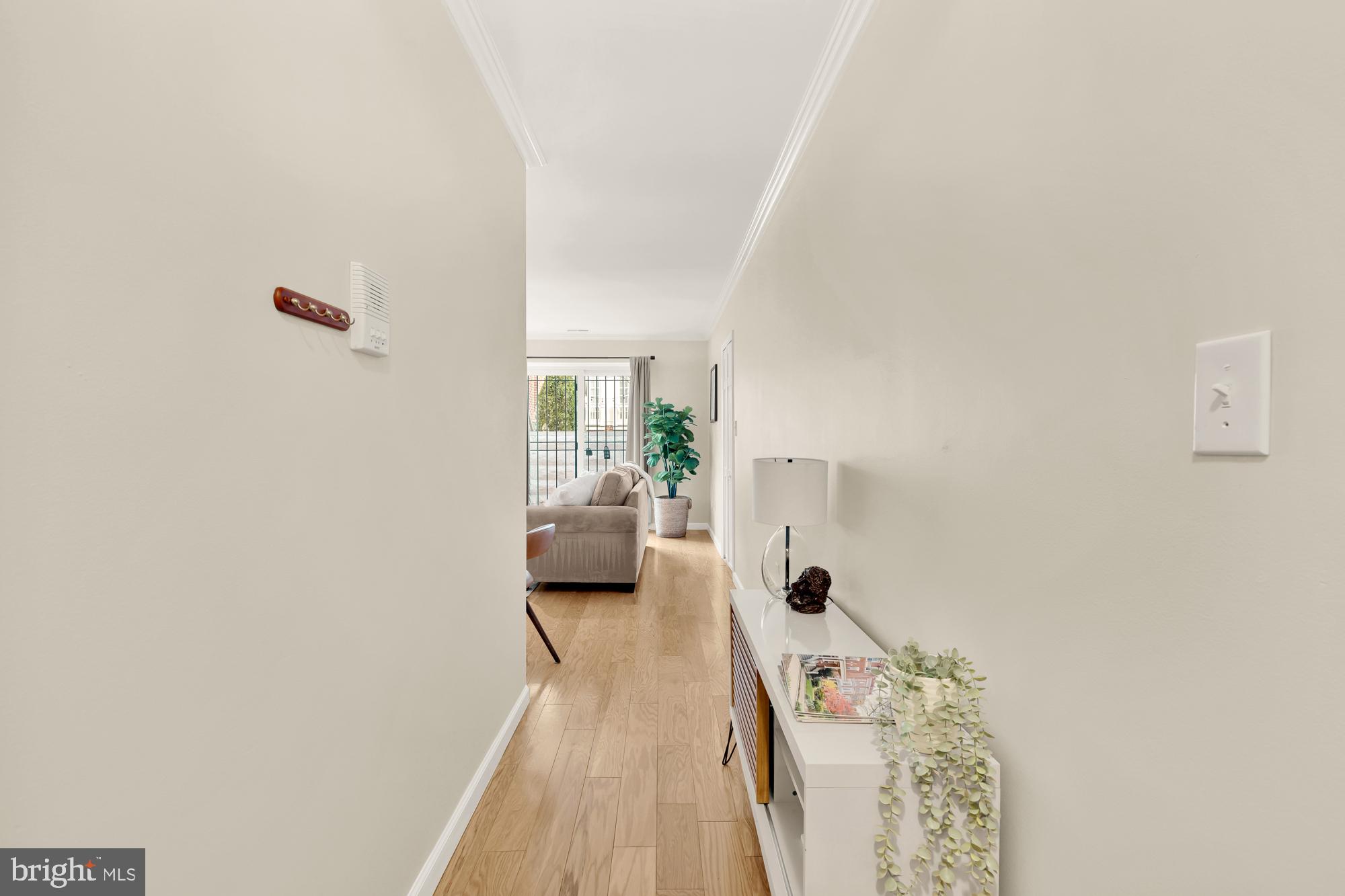 1801 Park Road Northwest, Unit 2 Washington, DC 20010 - Photo 17 of 45 a living room with furniture and a wooden floor
