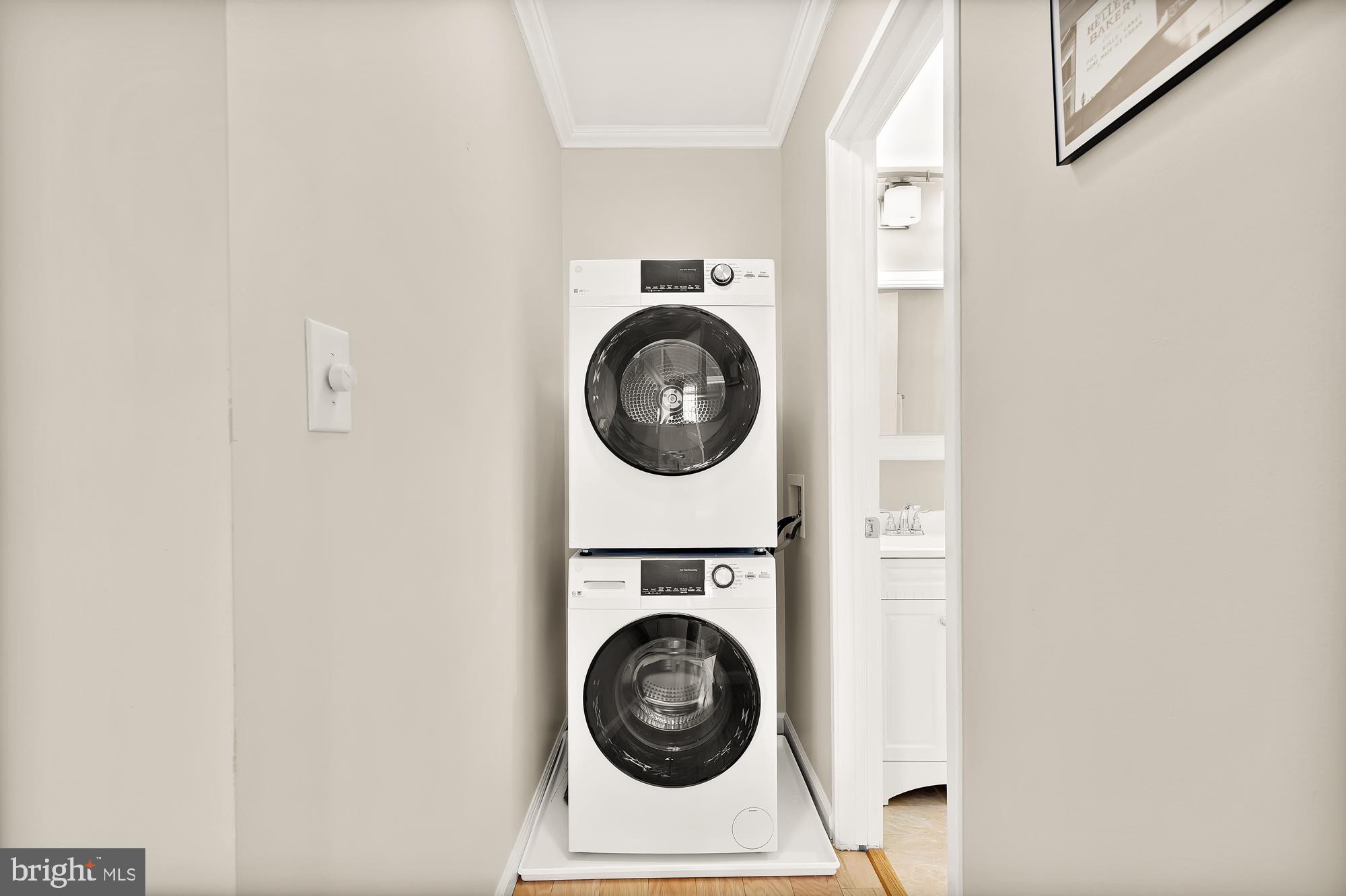 1801 Park Road Northwest, Unit 2 Washington, DC 20010 - Photo 19 of 45 a utility room with dryer and washer