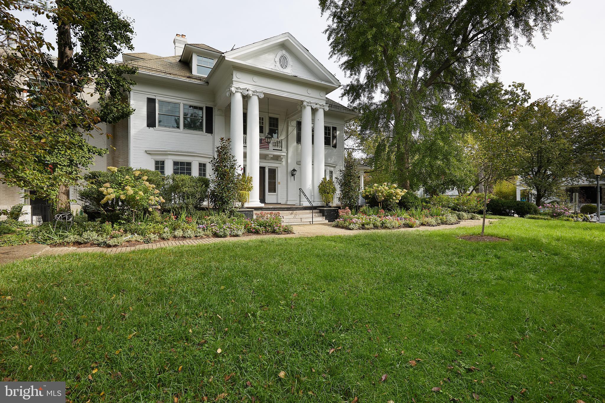 1801 Park Road Northwest, Unit 2 Washington, DC 20010 - Photo 2 of 45 a front view of house with yard and green space