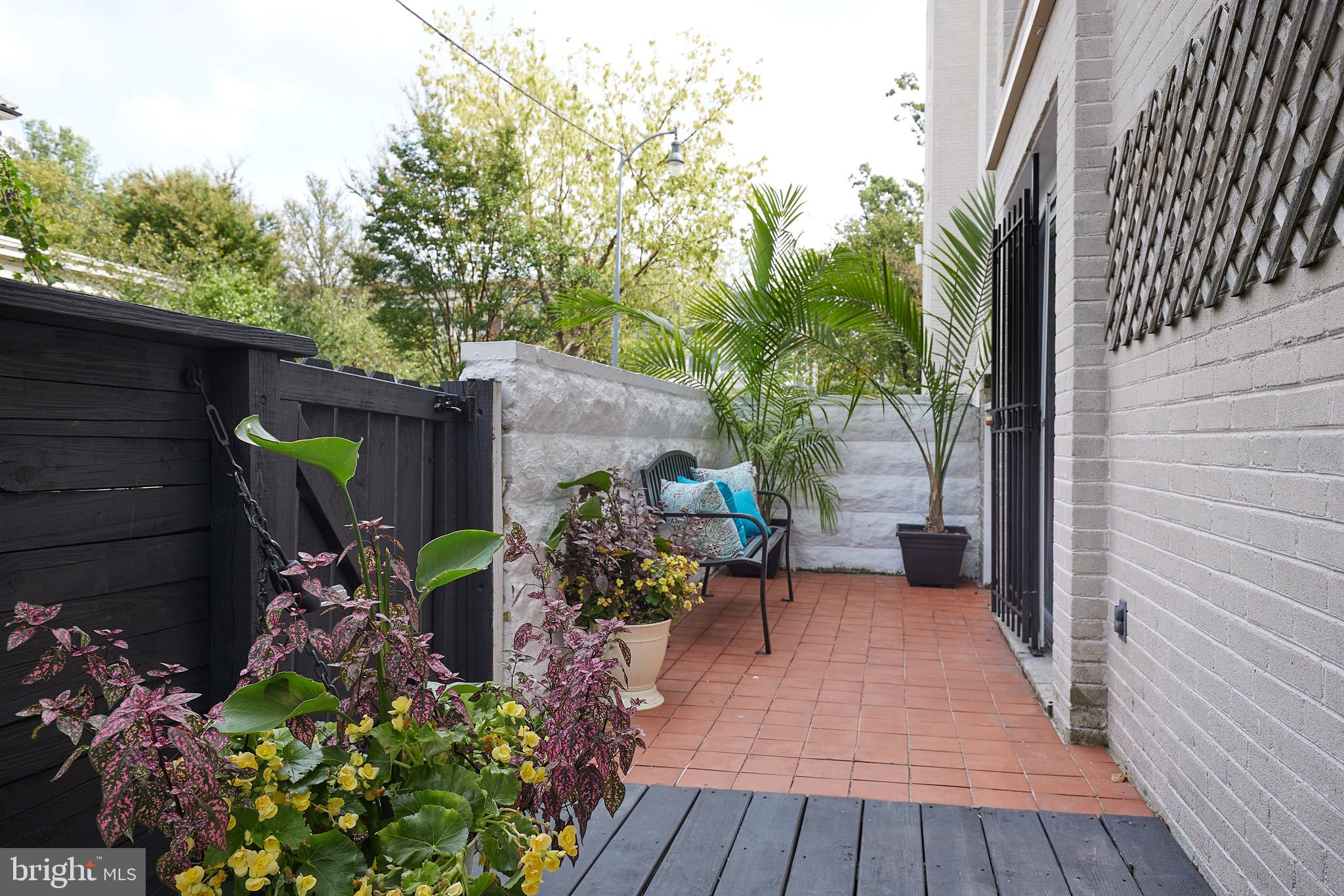 1801 Park Road Northwest, Unit 2 Washington, DC 20010 - Photo 31 of 45 a view of a backyard with sitting area