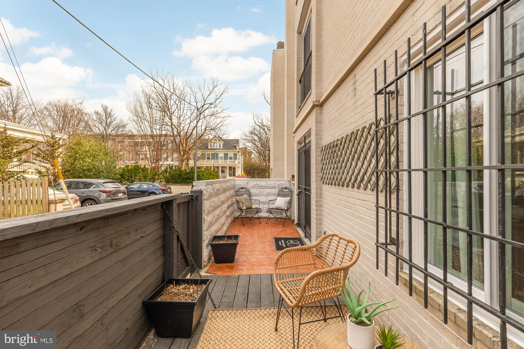 1801 Park Road Northwest, Unit 2 Washington, DC 20010 - Photo 35 of 45 a view of a patio with couches chairs and wooden floor