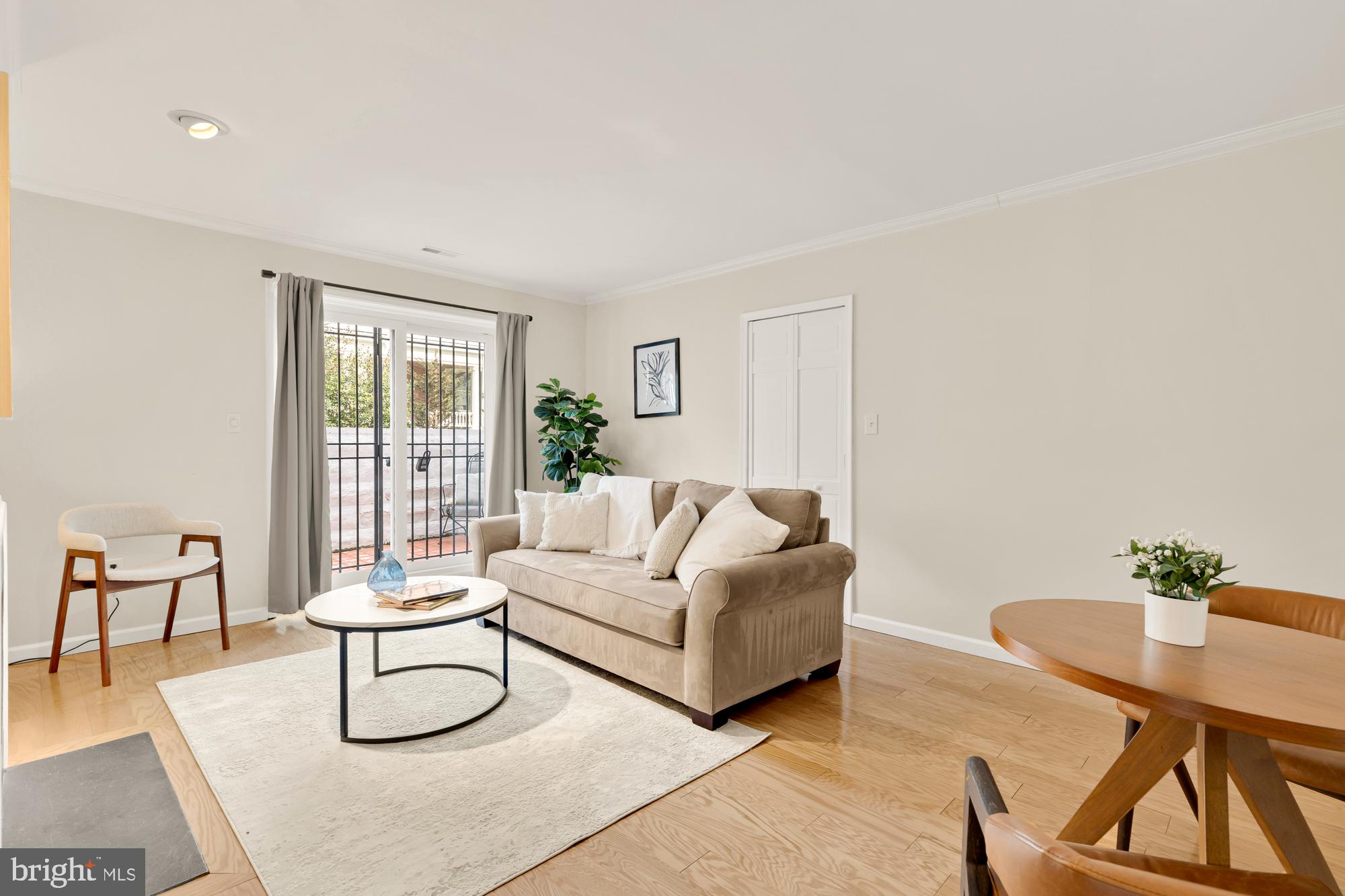 1801 Park Road Northwest, Unit 2 Washington, DC 20010 - Photo 10 of 45 a living room with furniture and a window