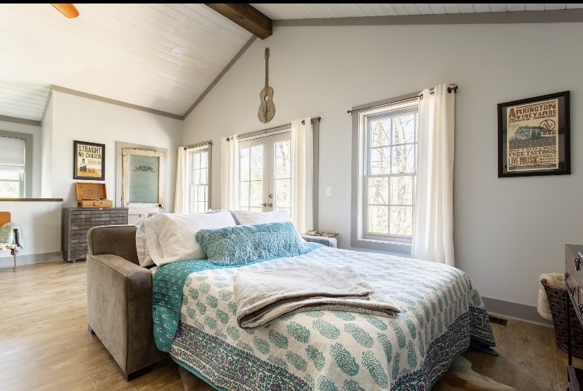 2917 Compton Road, Unit A Nashville, TN 37215 - Photo 5 of 12 a spacious bedroom with a bed and glass windows