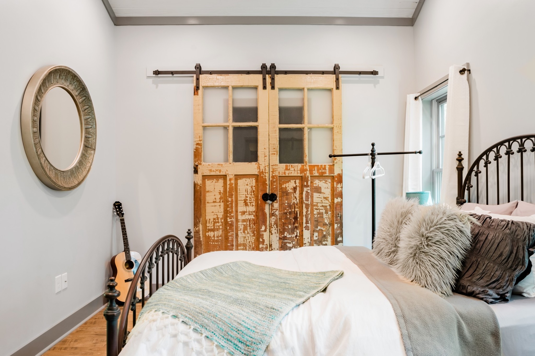 2917 Compton Road, Unit A Nashville, TN 37215 - Photo 7 of 12 a bedroom with a bed and a large mirror