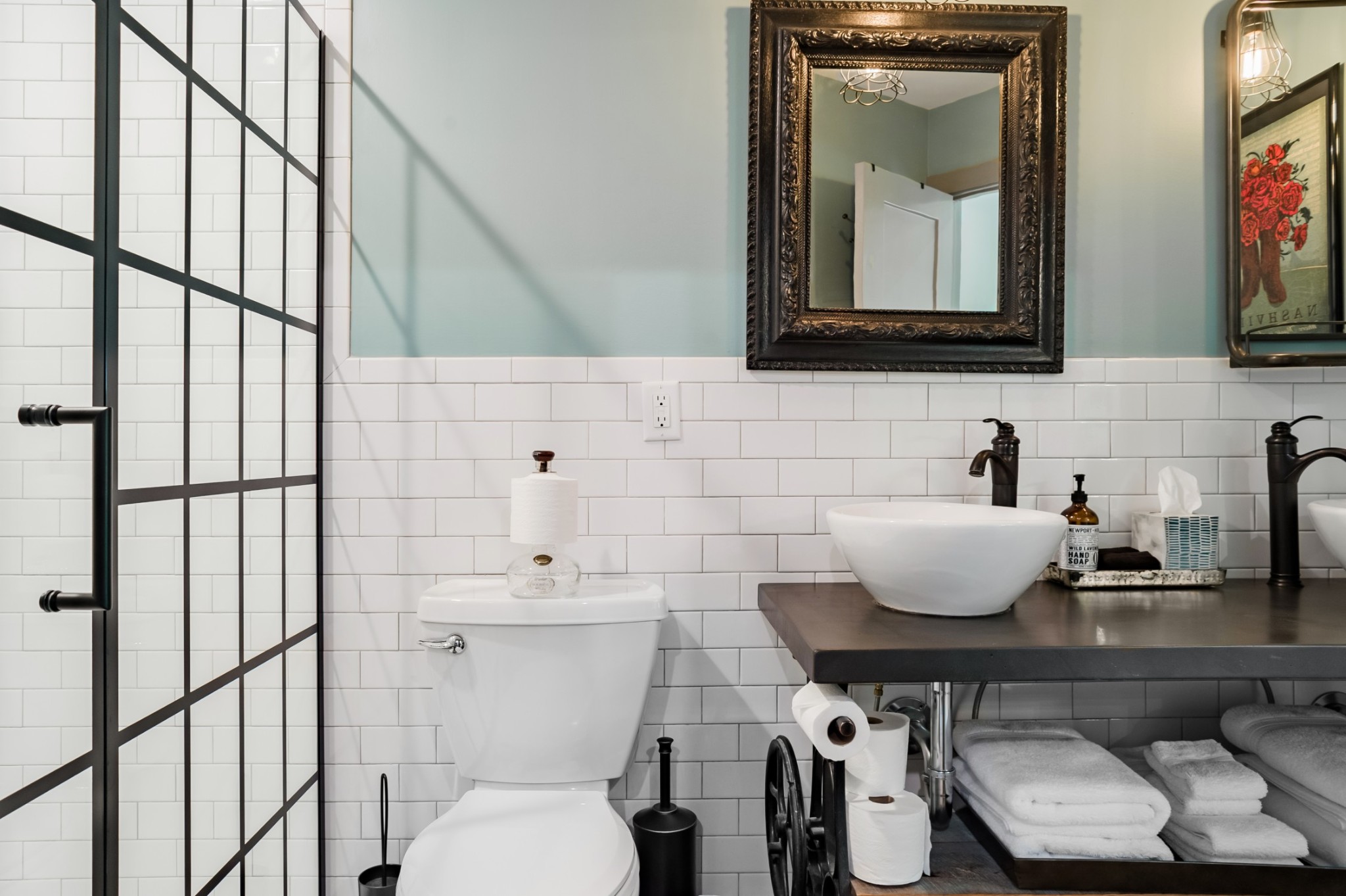 2917 Compton Road, Unit A Nashville, TN 37215 - Photo 8 of 12 a bathroom with a toilet a sink and mirror