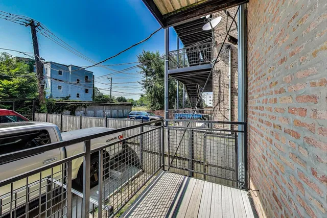 a view of a car park in front of a building