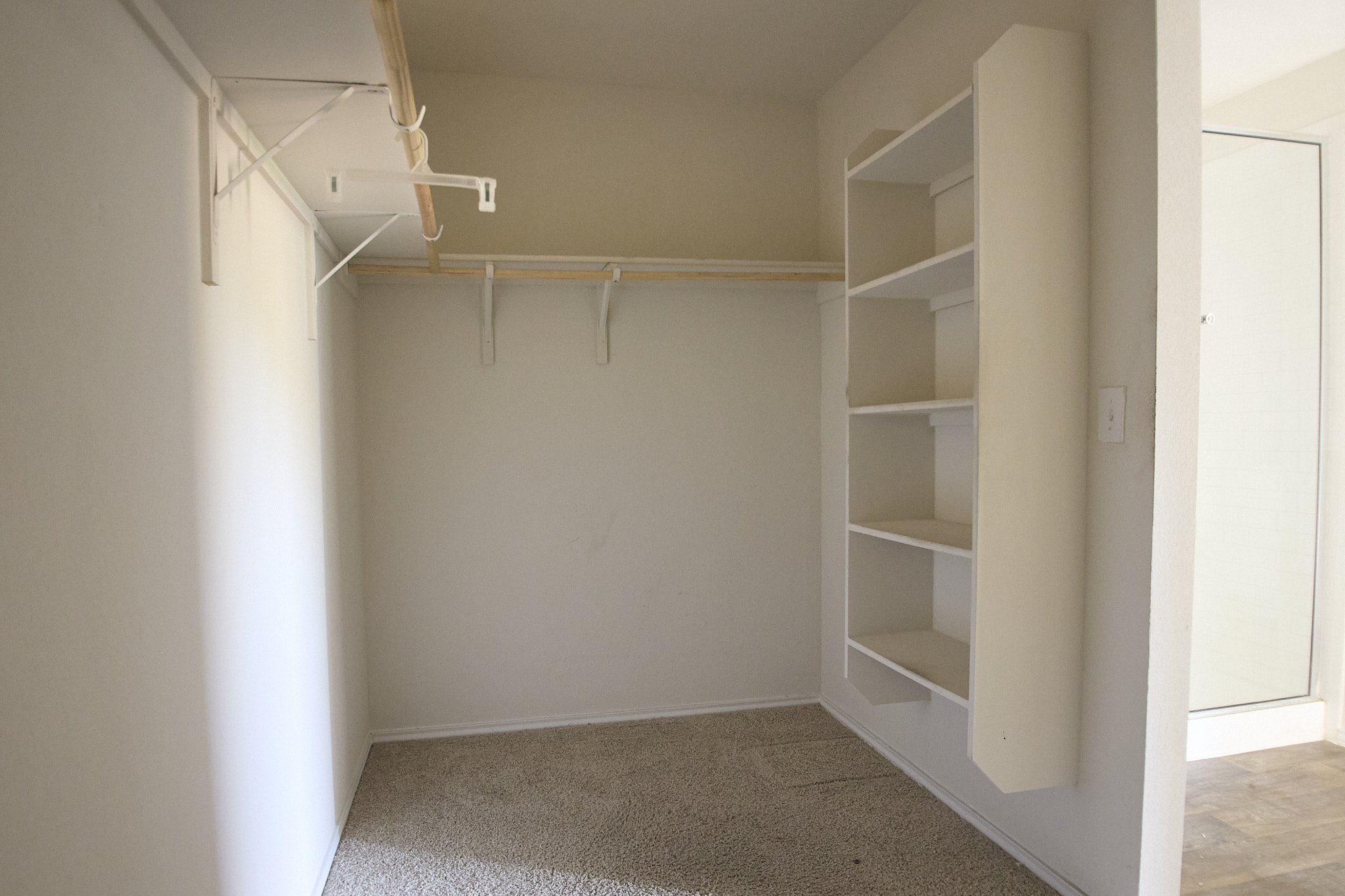 12008 Roving Pass Elgin, TX 78621 - Photo 15 of 20 Master Closet has room for it all!