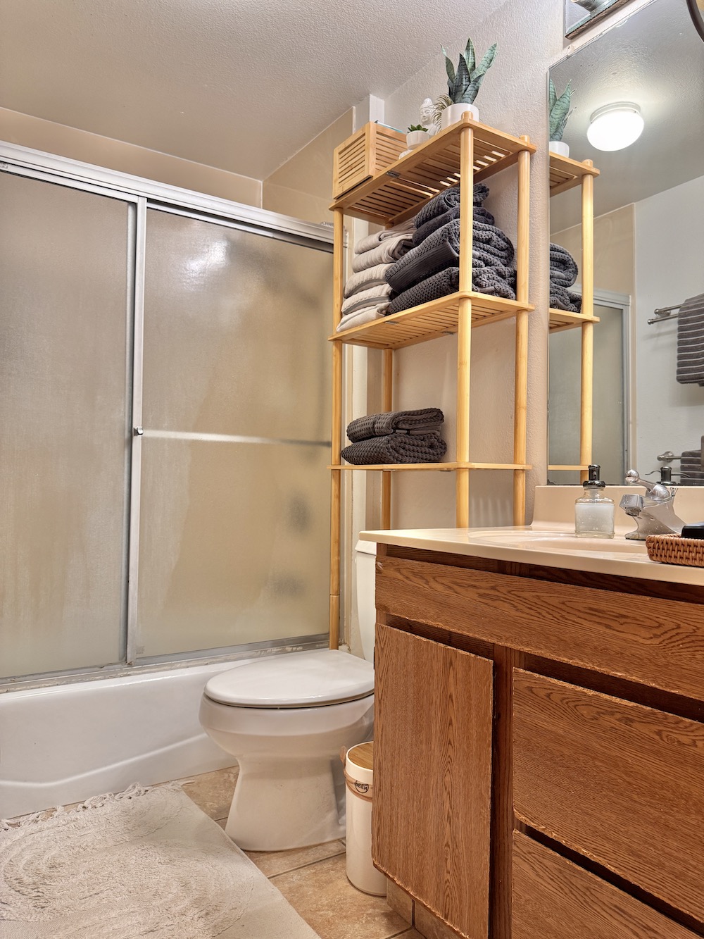 320 Papaloa Road, Unit 102 Kapaa, HI 96746 - Photo 14 of 22 a bathroom with a sink toilet and shower