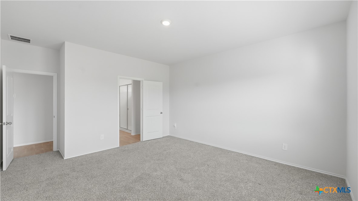 1708 Violeteared Way Lockhart, TX 78644 - Photo 13 of 25 a view of an empty room