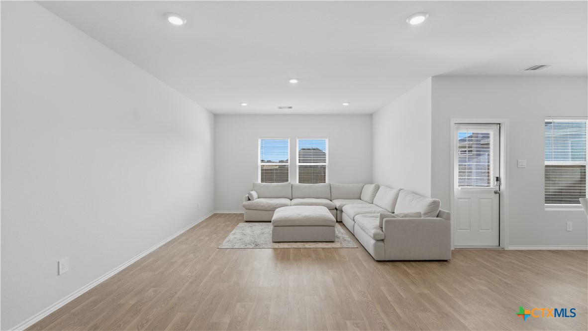 1708 Violeteared Way Lockhart, TX 78644 - Photo 4 of 25 a living room with furniture and a large window