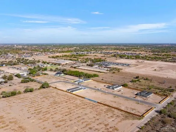 an aerial view of beach and ocean
