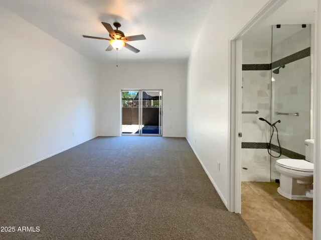 a view of a hallway with a outdoor space