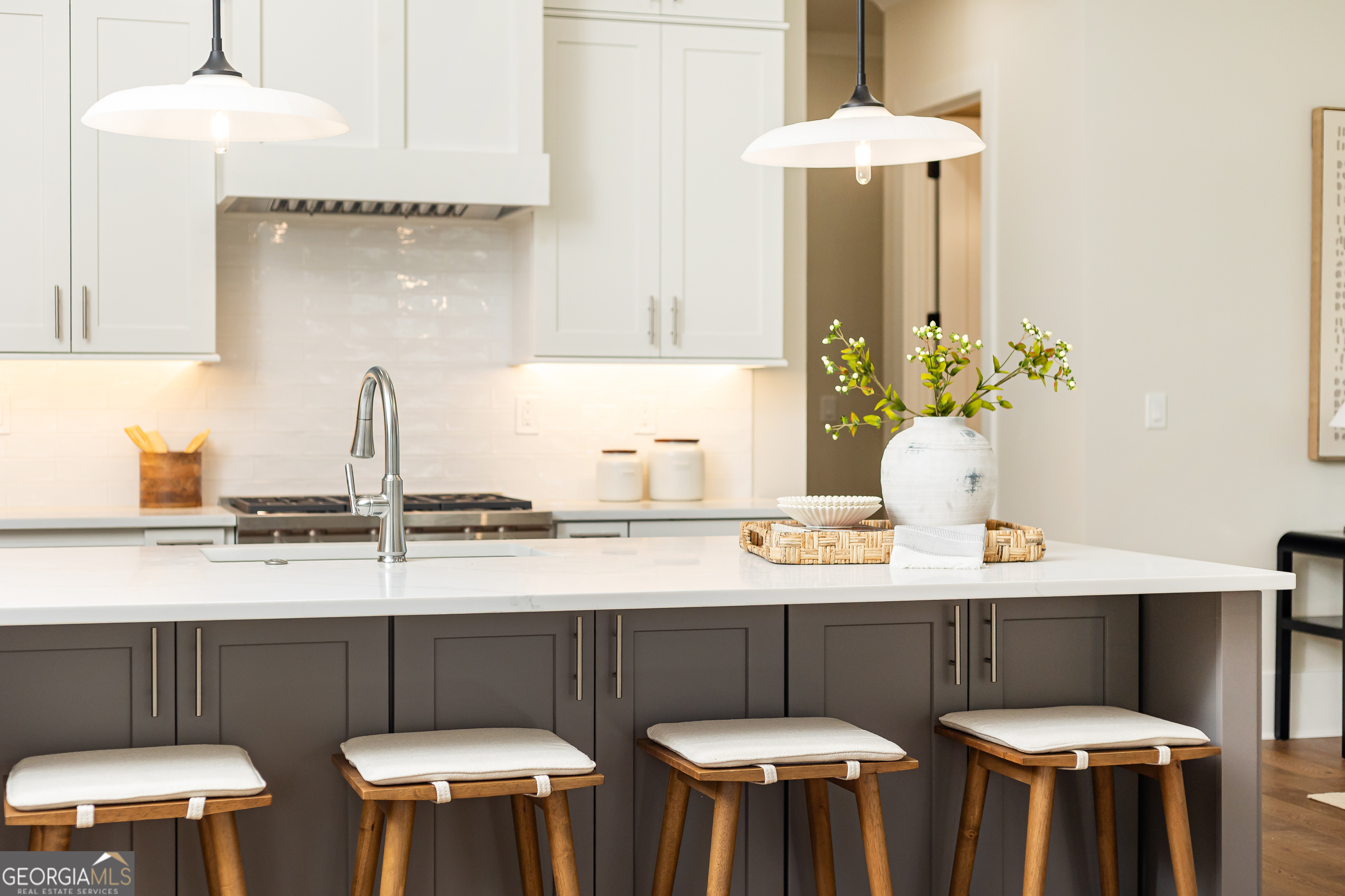 1992 Highgrove Court Atlanta, GA 30349 - Photo 14 of 22 a kitchen with stainless steel appliances a table and chairs in it