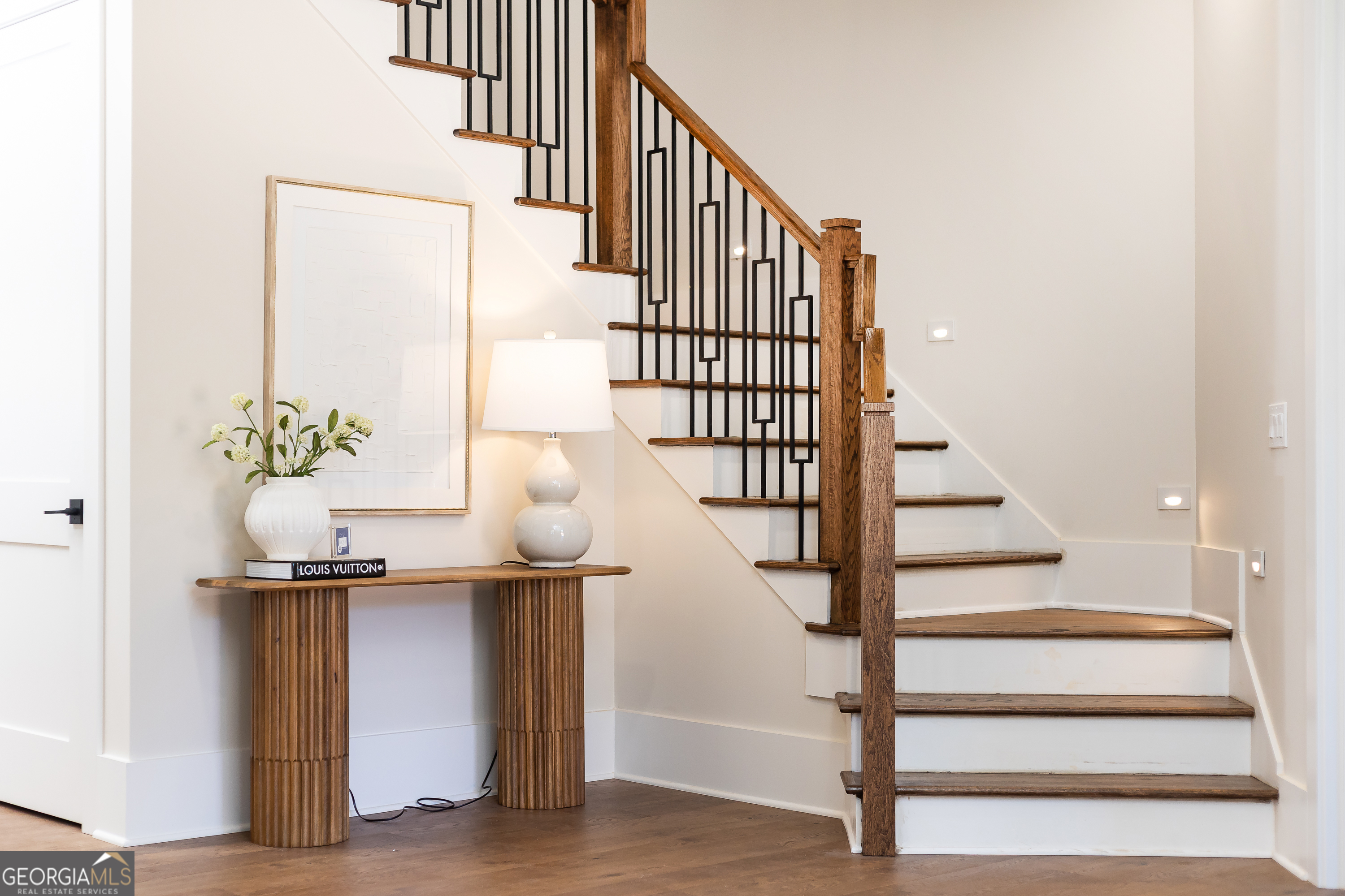 1992 Highgrove Court Atlanta, GA 30349 - Photo 16 of 22 a view of entryway and hall with wooden floor