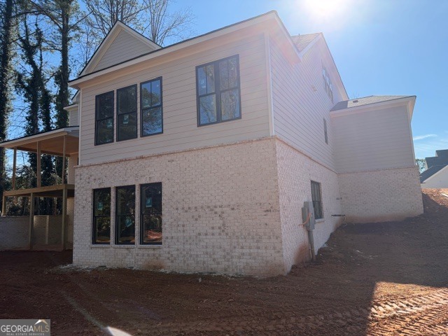 1992 Highgrove Court Atlanta, GA 30349 - Photo 4 of 22 a view of a house with a yard