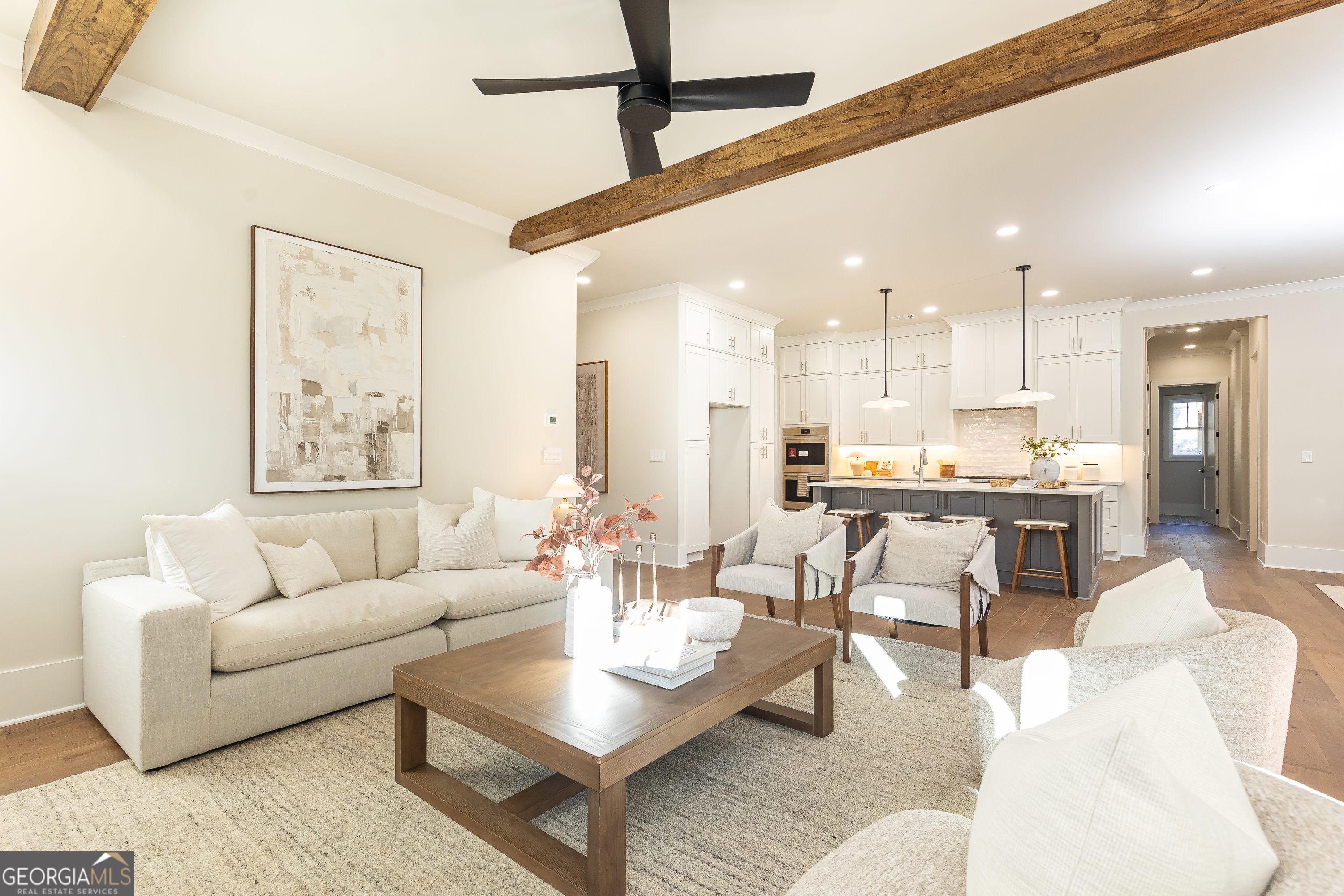 1992 Highgrove Court Atlanta, GA 30349 - Photo 9 of 22 a living room with furniture kitchen view and a large window