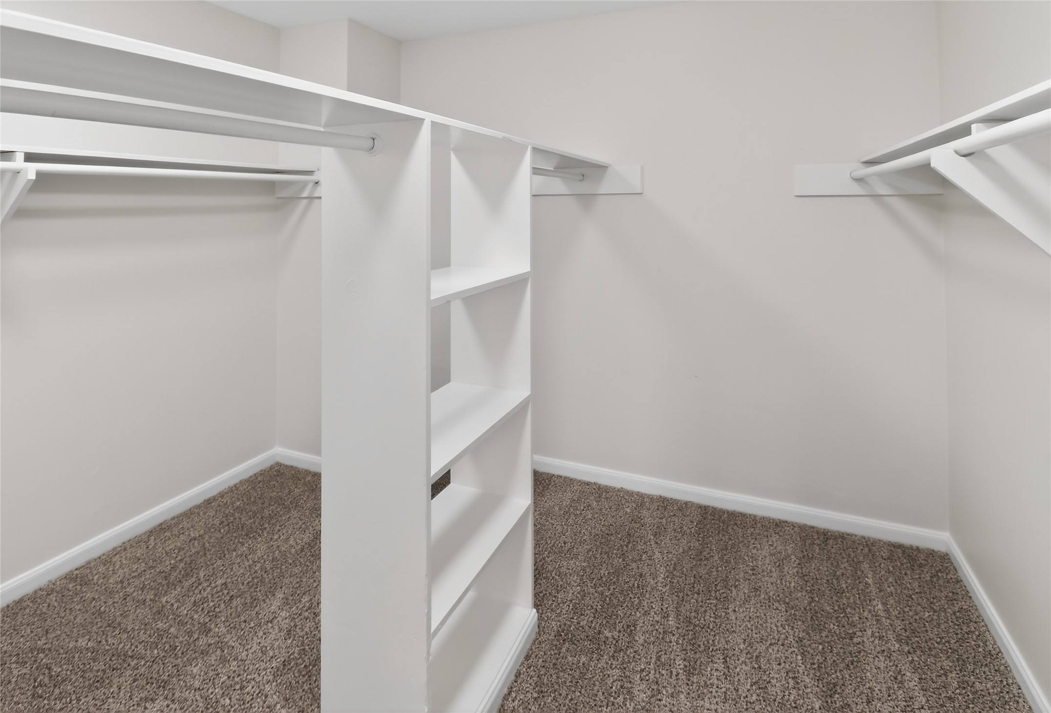 133 Cherry Tree Lane Friendswood, TX 77546 - Photo 12 of 27 a view of walk in closet with empty racks