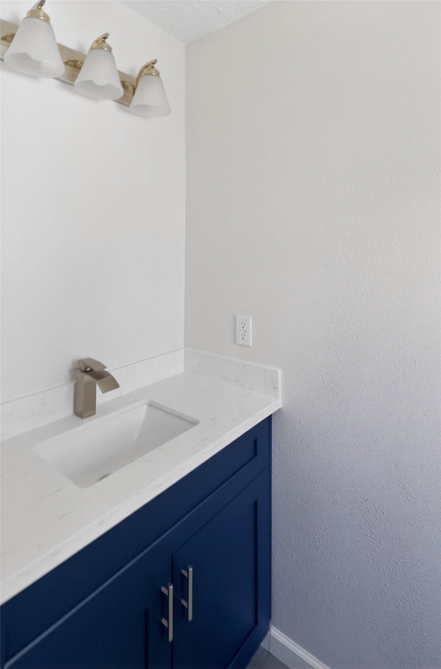 133 Cherry Tree Lane Friendswood, TX 77546 - Photo 21 of 27 a bathroom with a sink and a mirror