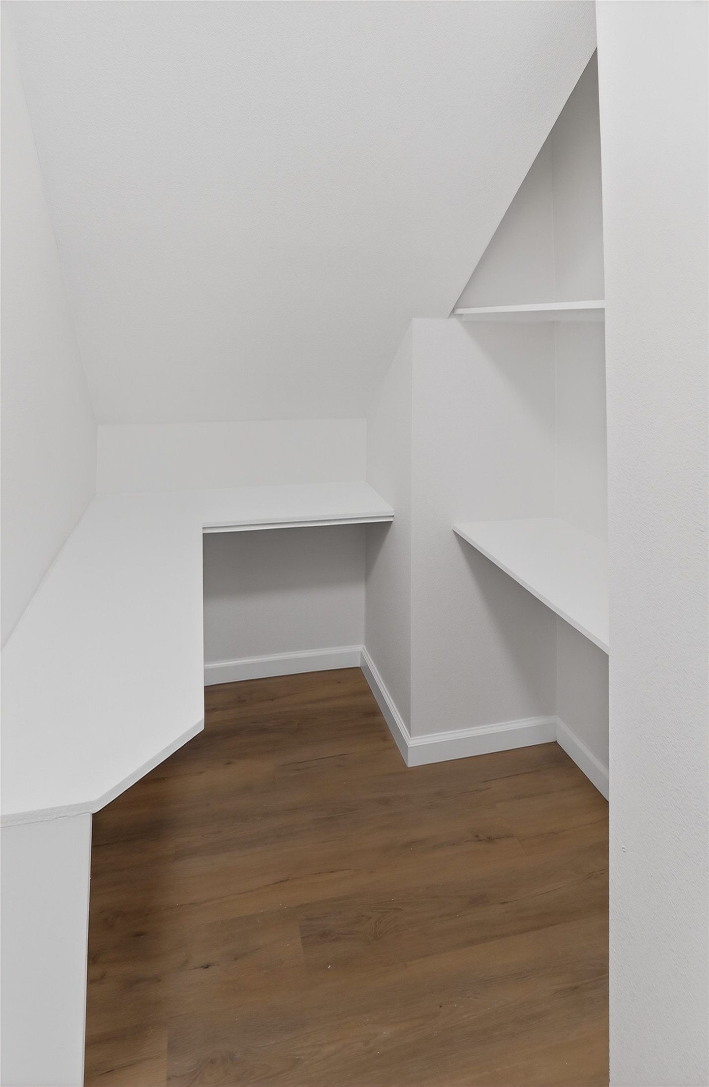 133 Cherry Tree Lane Friendswood, TX 77546 - Photo 9 of 27 a view of an empty room with wooden floor