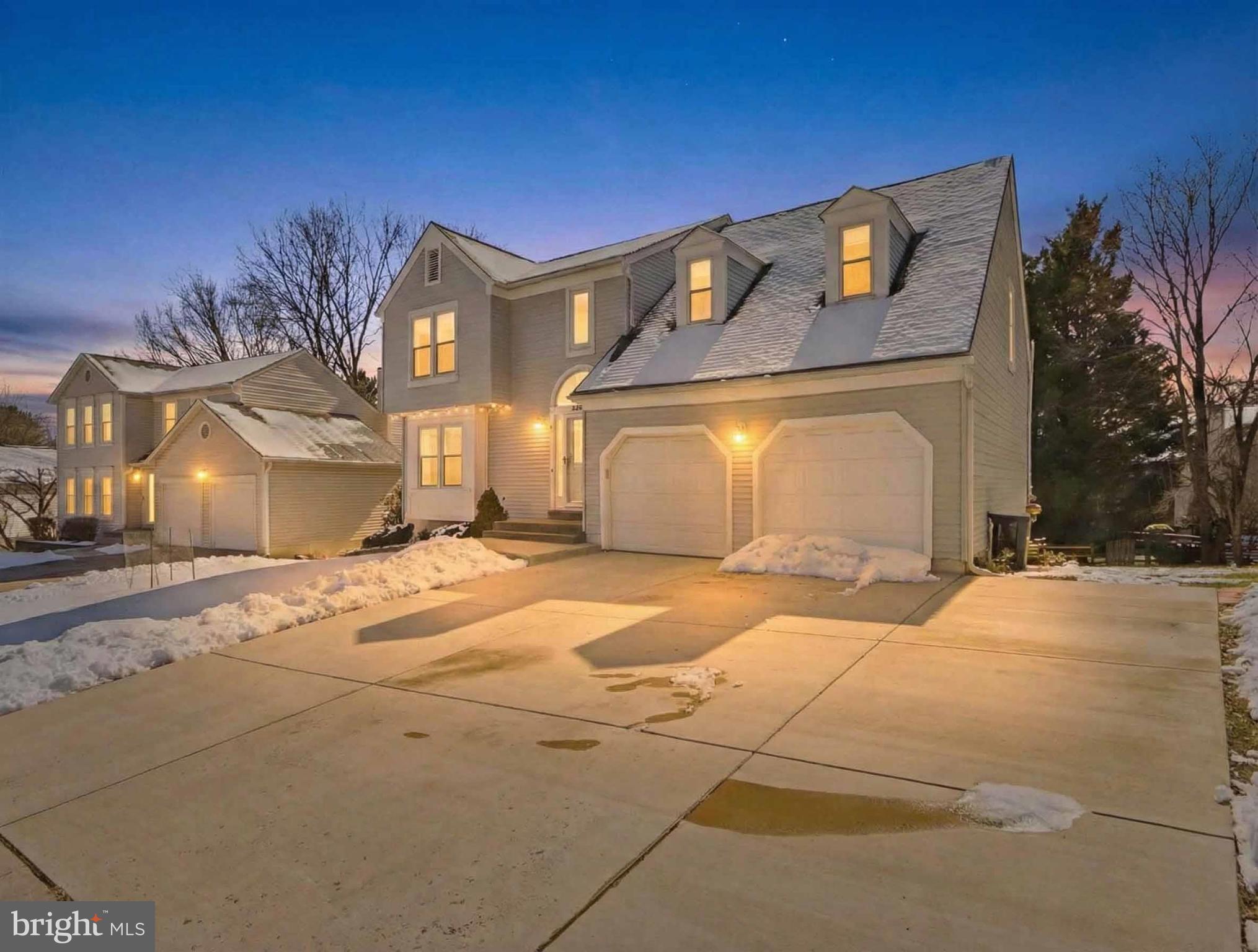 12208 Stoney Bottom Road Germantown, MD 20874 - Photo 2 of 52 a view of a house with snow on the road
