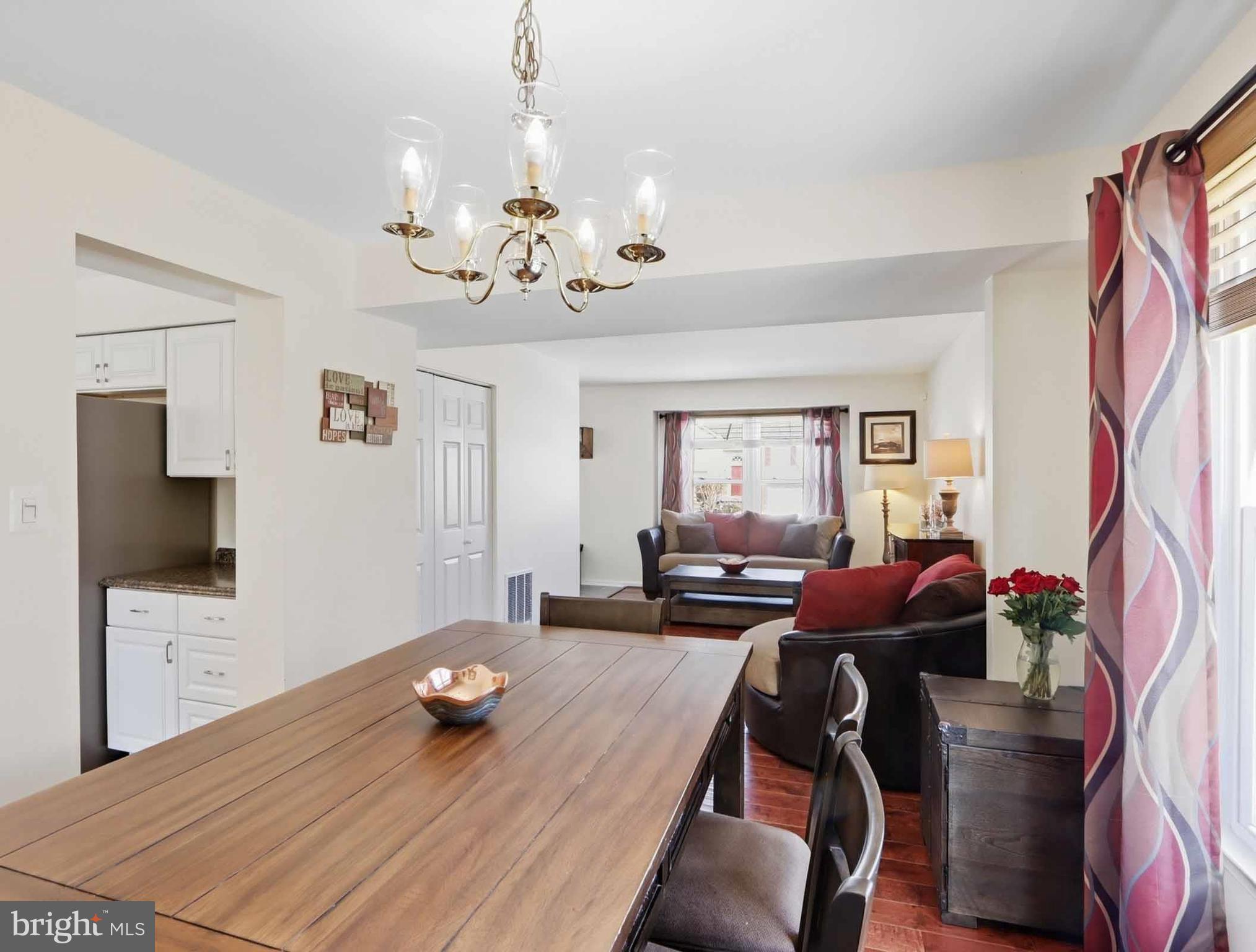 12208 Stoney Bottom Road Germantown, MD 20874 - Photo 21 of 52 a view of a livingroom with furniture and window