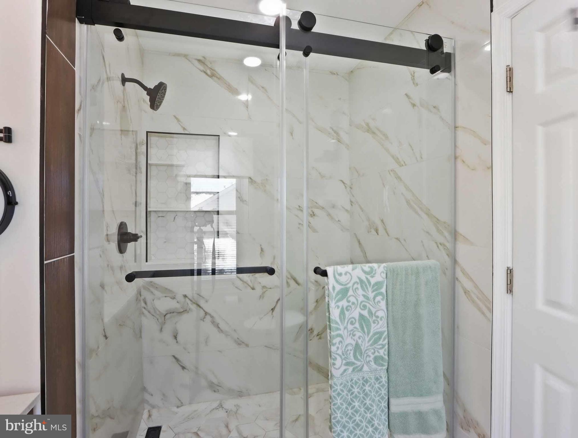 12208 Stoney Bottom Road Germantown, MD 20874 - Photo 29 of 52 a bathroom with a shower