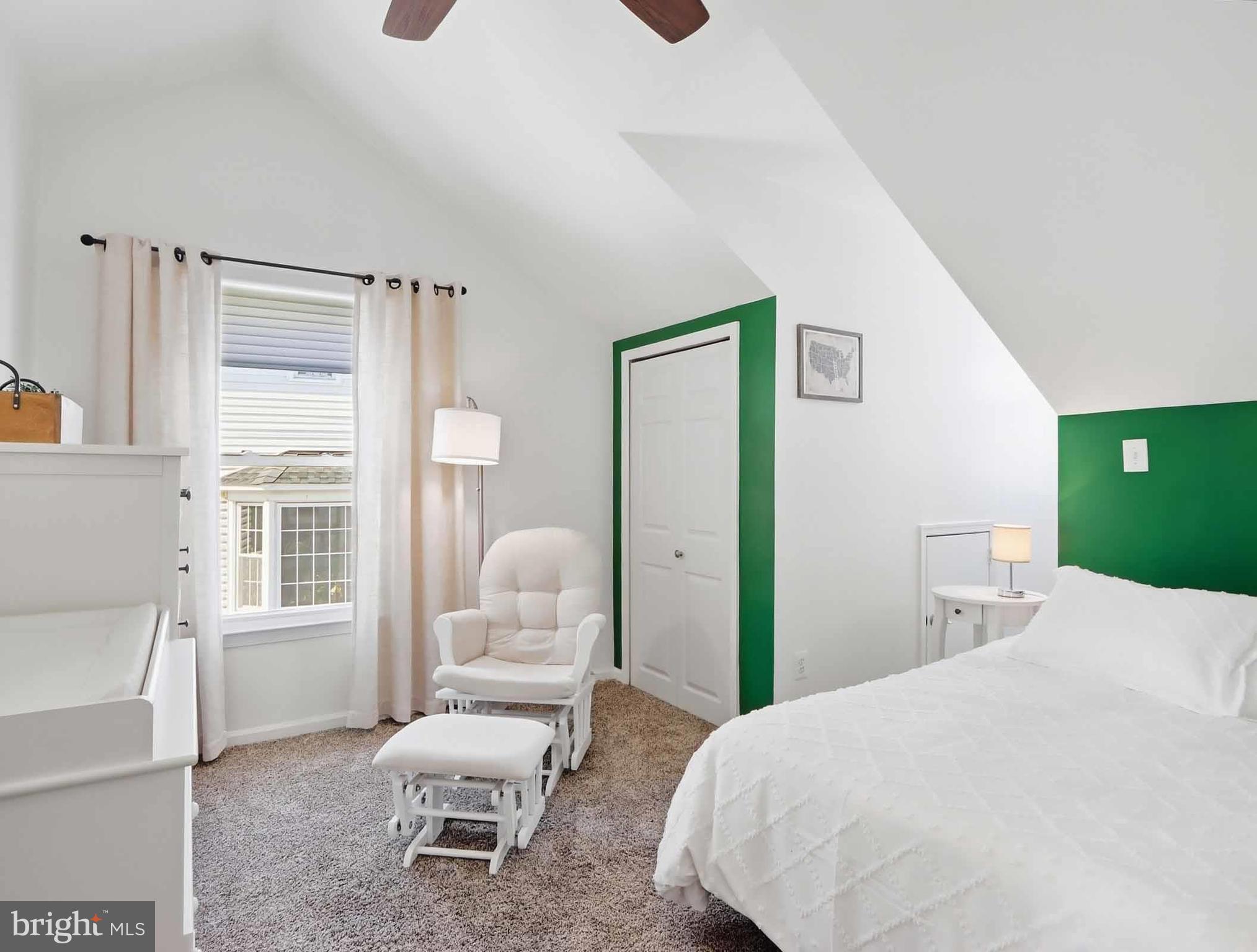 12208 Stoney Bottom Road Germantown, MD 20874 - Photo 31 of 52 a bedroom with a bed and a window