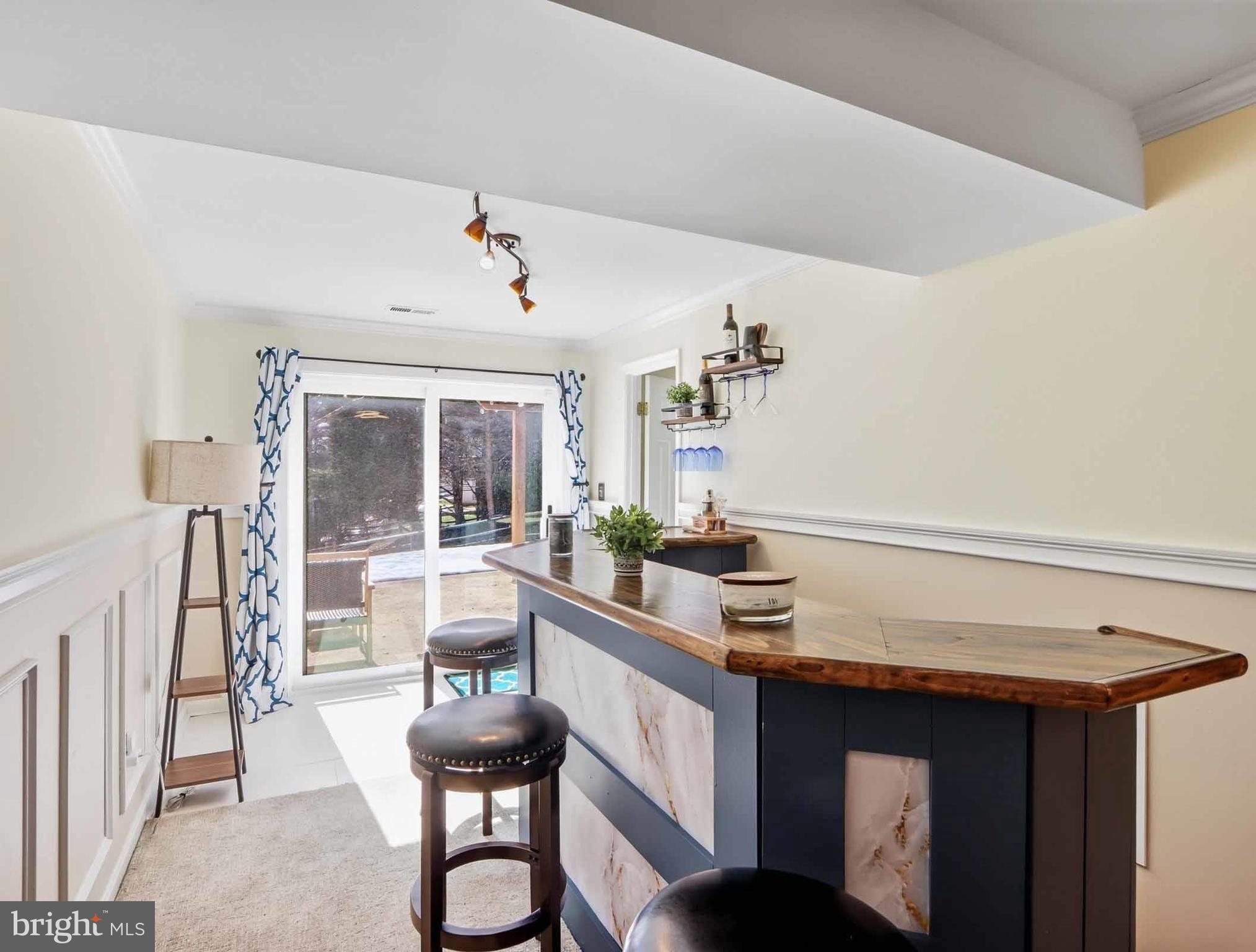 12208 Stoney Bottom Road Germantown, MD 20874 - Photo 37 of 52 a dining room with furniture and window